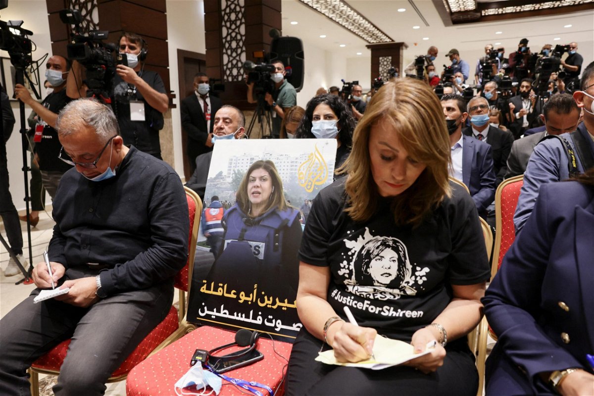 <i>Evelyn Hockstein/Reuters</i><br/>An image of slain Palestinian-American journalist Shireen Abu Akleh is placed on a chair