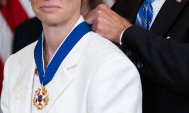 Megan Rapinoe's suit is embroidered with the initials 'BG