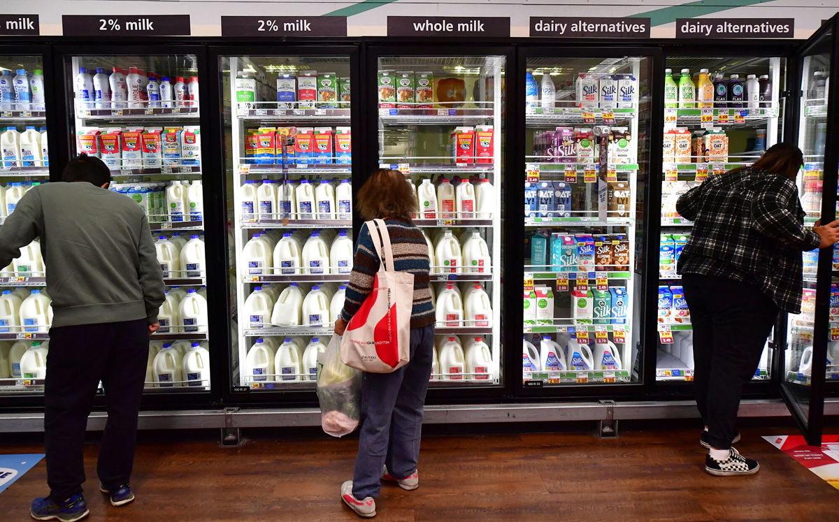 <i>Frederic J. Brown/AFP/Getty Images</i><br/>People shop at a grocery store in Monterey Park