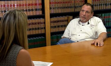 Geoffrey Auer Sr. claims he was unjustly arrested and Woodfin police officers used excessive force while doing so.