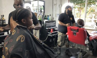 The Witherite Law Group and V-103 teamed up with Rapper Killer Mike's barbershops to get Fulton and DeKalb County kids ready for their first day of school on Monday.