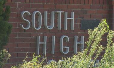 An assembly at South High School advised students to avoid police when dealing with racially motivated attacks.