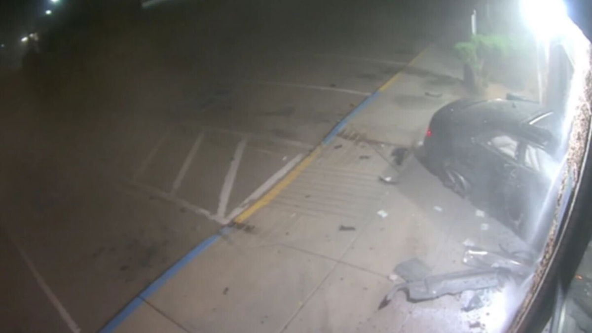 <i>Colorado Department of Motor Vehicles/KPTV</i><br/>Video surveillance footage recently captured an accused drunk driver slamming their car sideways into a branch office of the Colorado Department of Motor Vehicles.