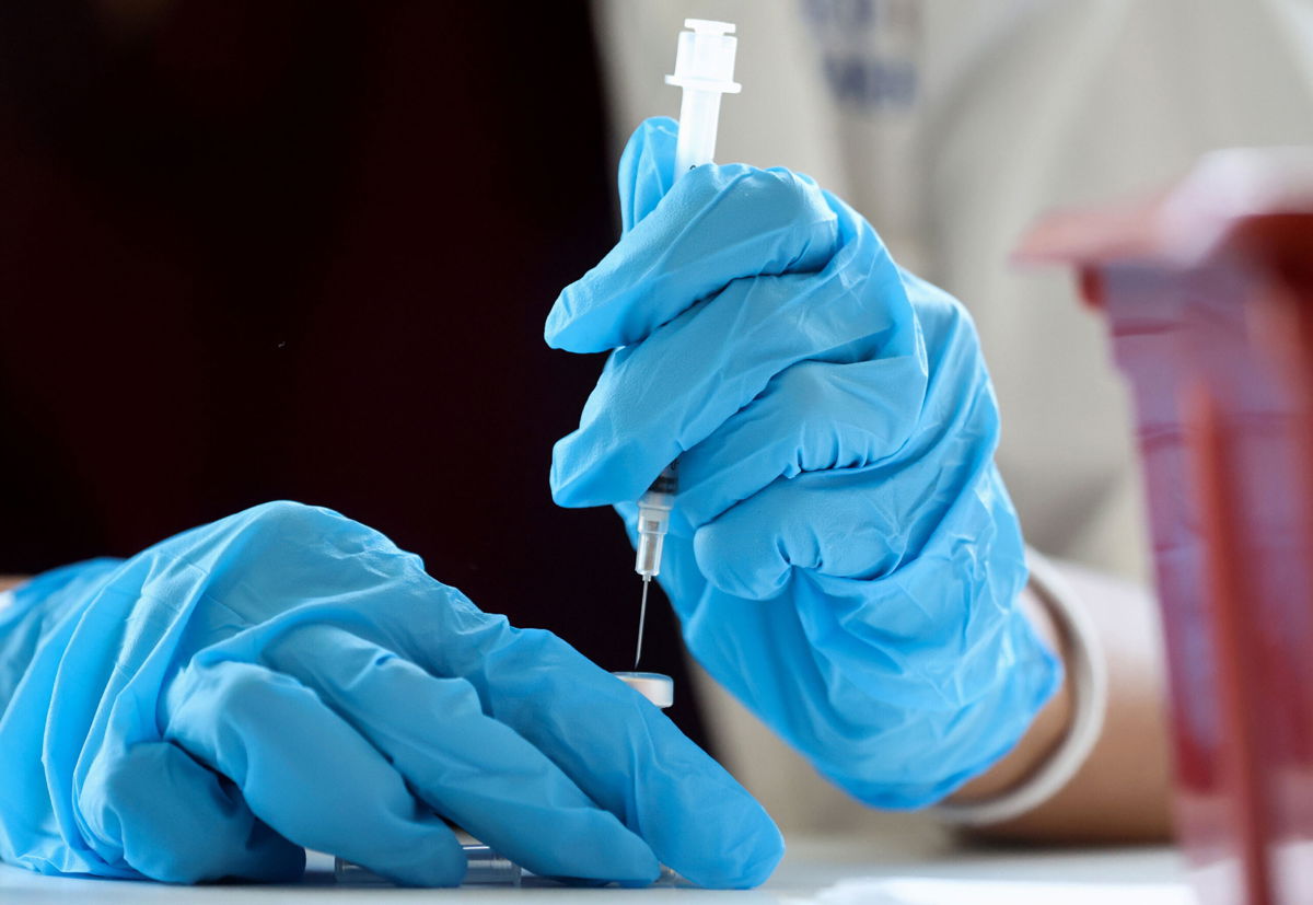 <i>Mario Tama/Getty Images</i><br/>A pharmacist prepares a dose of the Jynneos monkeypox vaccine on August 3 in West Hollywood