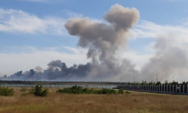 Smoke rises after explosions were heard from the direction of a Russian military base in Crimea on August 9.