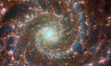 M74 shines at its brightest in this combined optical/mid-infrared image