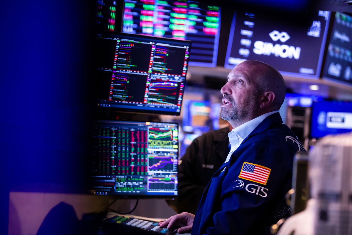 <i>Michael Nagle/Bloomberg/Getty Images</i><br/>A trader works on the floor of the New York Stock Exchange on June 27. Shares of AMTD Digital have shot up 21