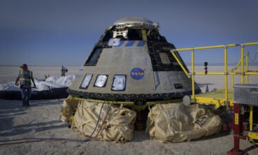 Boeing and NASA teams work around Boeings CST-100 Starliner spacecraft on May 25 at the White Sands Missle Range