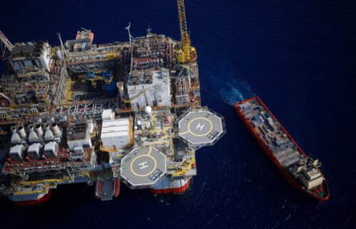 A platform supply vessel sits anchored next to the Chevron Corp. Jack/St. Malo deepwater oil platform in the Gulf of Mexico off the coast of Louisiana. Shell and Chevron shut oil platforms in the Gulf of Mexico after a leak knocked a pair of pipelines offline.