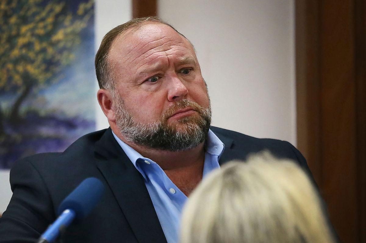 <i>Briana Sanchez/AP</i><br/>Conspiracy theorist Alex Jones attempts to answer questions about his emails asked by Mark Bankston