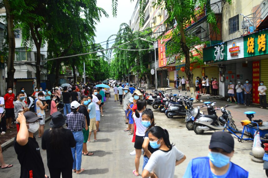 People line up for nucleic acid testing in Sanya