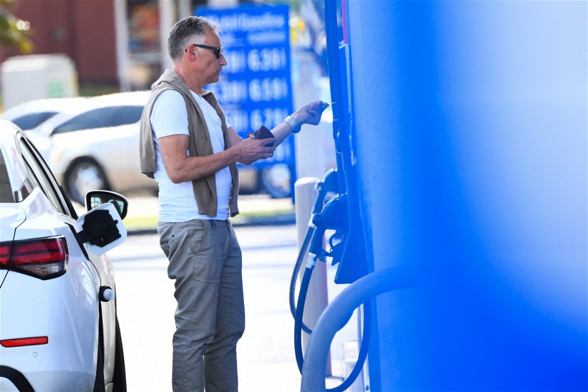 <i>Patrick T. Fallon/AFP/Getty Images</i><br/>A customer uses a credit card before they pump gas at a Mobil gas station on April 28