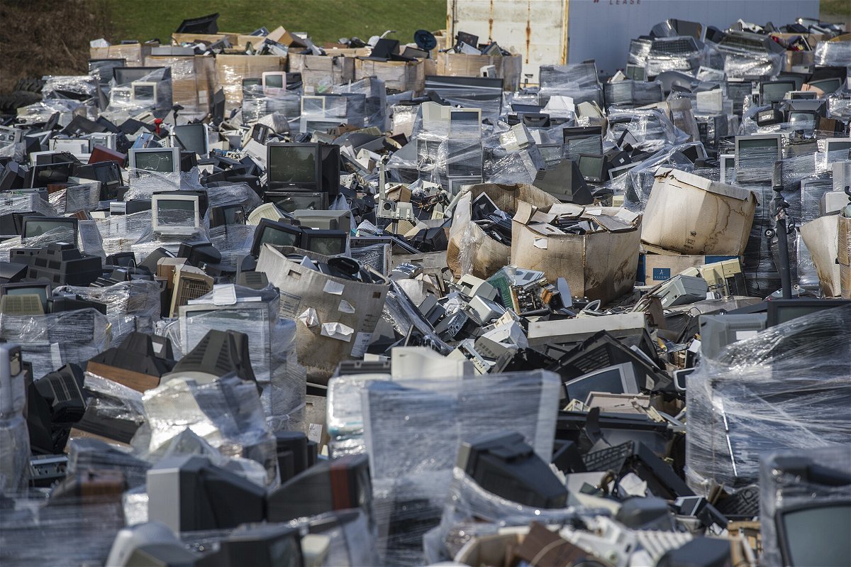 <i>Dan Speicher/Pittsburgh Tribune-Review/AP</i><br/>A sea of electronic waste stacked over six feet high cover the landscape at Westmoreland Cleanways and Recycling