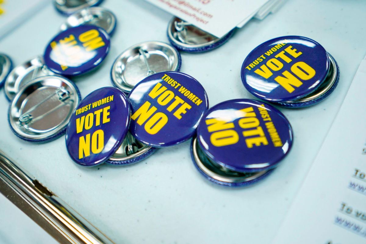 <i>Kyle Rivas/Getty Images</i><br/>Badges are laid out for canvassers in Overland Park
