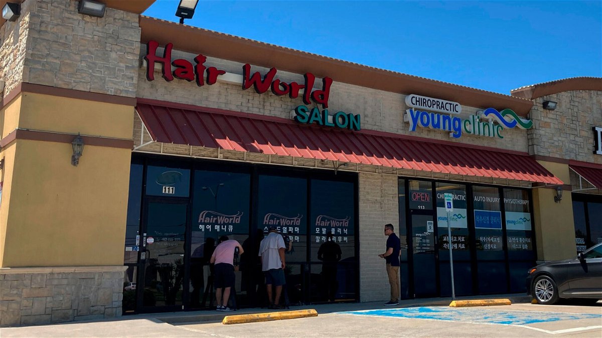 <i>Jamie Stengle/AP</i><br/>A man accused of shooting three people at Hair World Salon