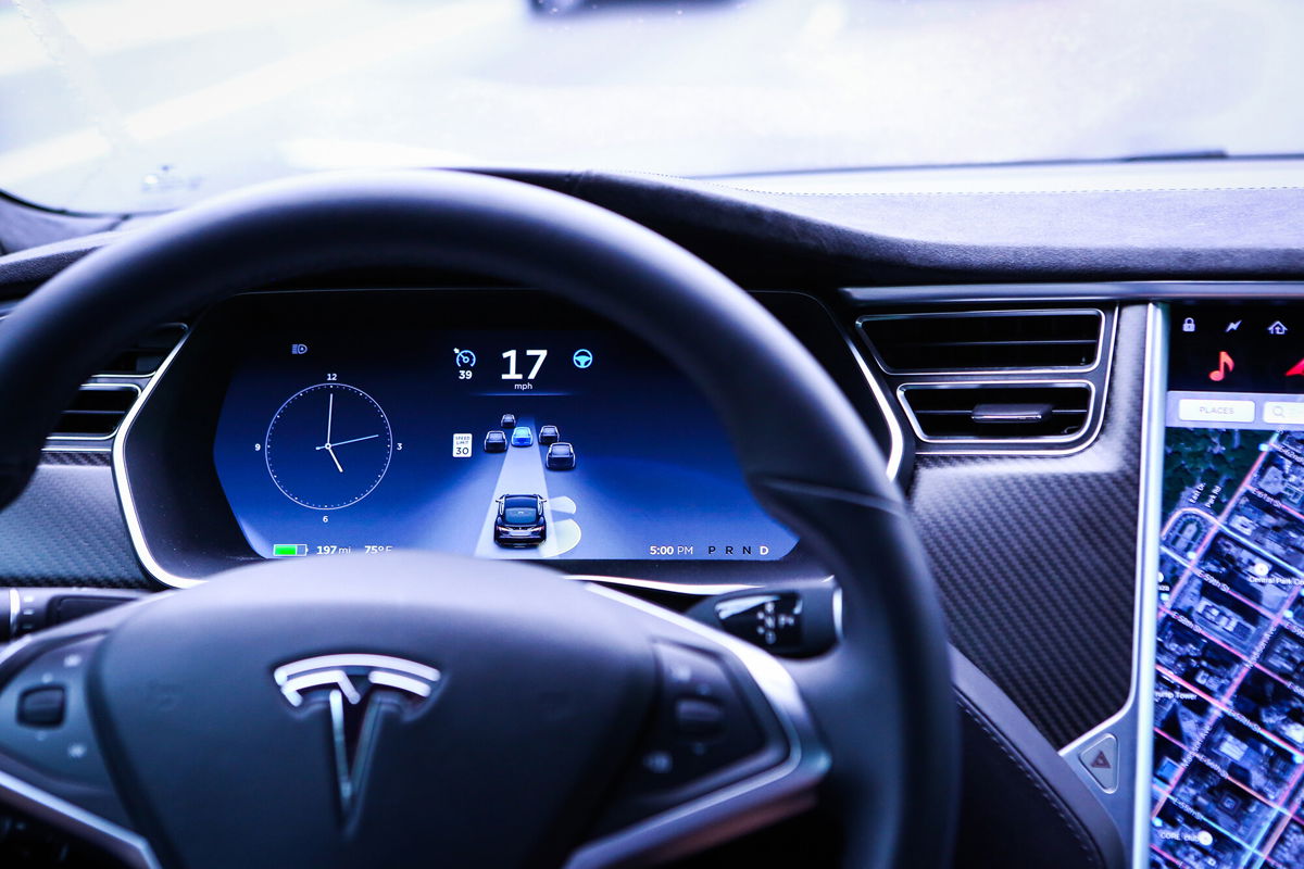 <i>Christopher Goodney/Bloomberg/Getty Images</i><br/>An instrument panel illustrates the road ahead using Autopilot technology inside a Model S P90D vehicle in New York in September 2016. Tesla 'full self-driving' debate escalates with legal threats and banned videos.