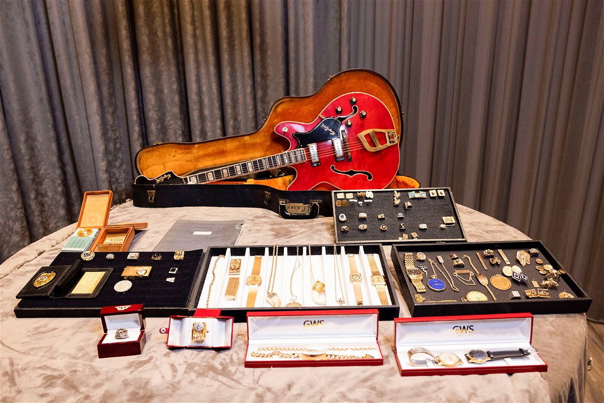 <i>Aude Guerrucci/REUTERS</i><br/>A view of a guitar and a collection of personal jewelry of Elvis Presley & Colonel Tom Parker