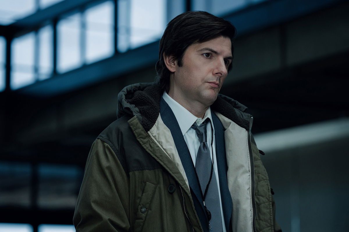 <i>Atsushi Nishijima/Apple TV+</i><br/>The outie version of Mark (Adam Scott) lives in a dimly lit and sparsely decorated townhome in a Lumon-owned neighborhood.