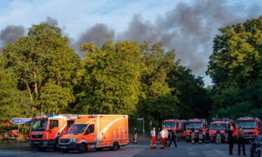 A large fire broke out on August 4 in one of Berlin's biggest city forests -- the Grunewald -- following several explosions at a police-run munitions disposal site inside the forest. Fire engines are pictured here responding to the fire.