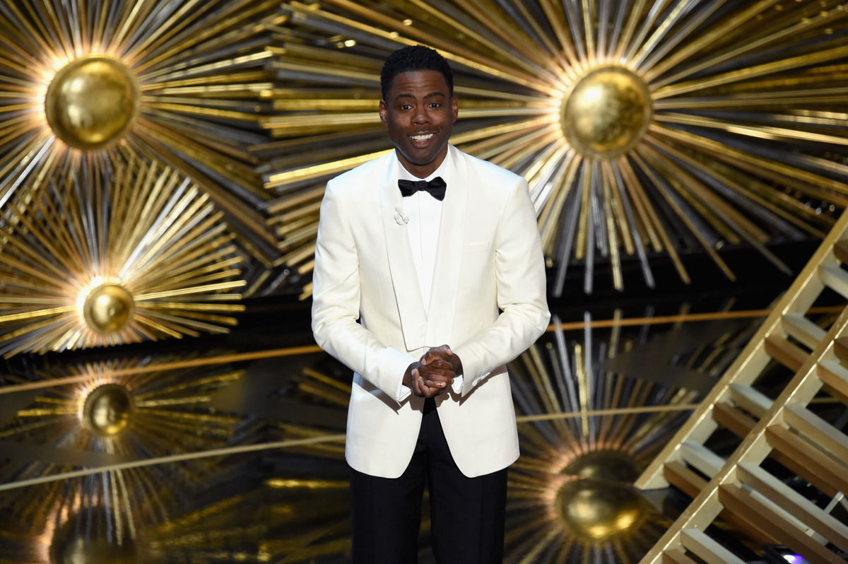 <i>Kevin Winter/Getty Images North America/Getty Images</i><br/>Chris Rock says he was asked to host the Academy Awards next year after he was slapped on stage by fellow actor Will Smith while presenting an award on stage at the ceremony in March.