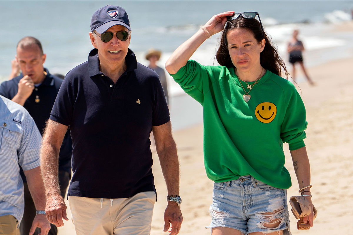 <i>Manuel Balce Ceneta/AP</i><br/>President Joe Biden walks on the beach with daughter Ashley Biden