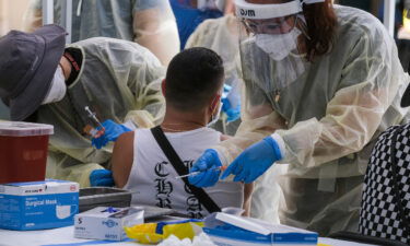 A healthcare worker is seen here preparing the monkeypox vaccine in Los Angeles in July. The US Department of Health and Human Services waited more than three weeks after the first confirmed case of monkeypox in the US to order bulk stocks of the vaccine in fear they may lose years of shelf life.