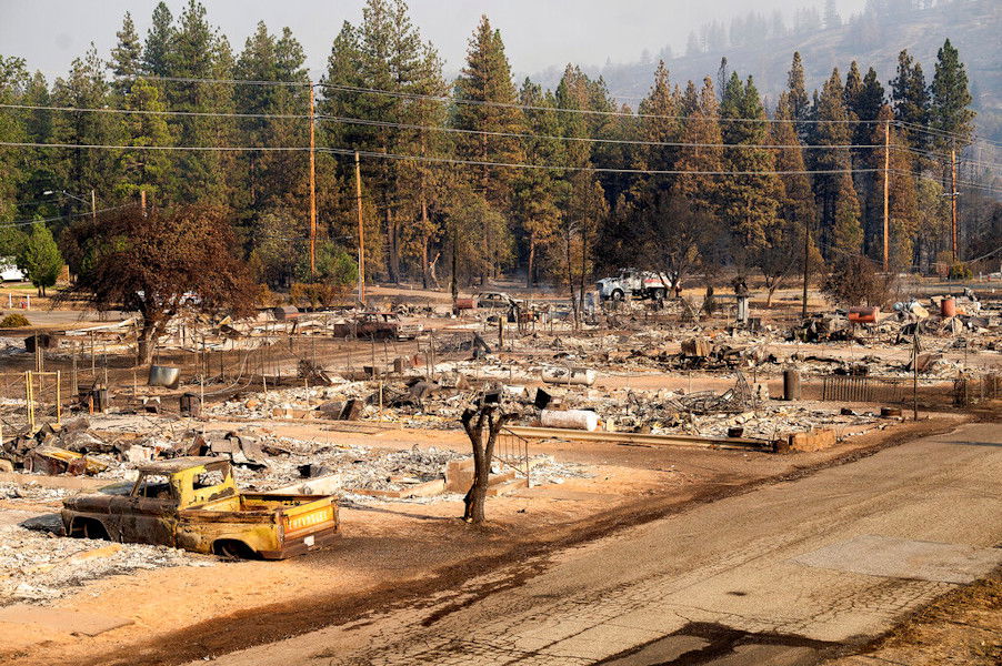 omes destroyed by the Mill Fire line Wakefield Ave. on Saturday in Weed, Calif