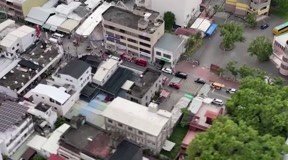 This aerial image shows a building collapse following an earthquake in Taiwan