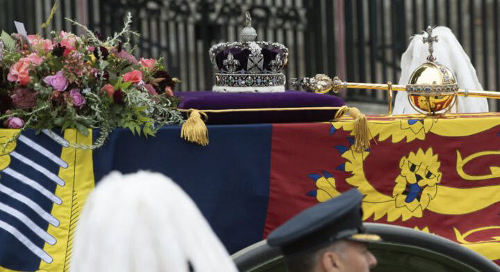 <i>Sarah Tilotta/CNN</i><br/>The Queen’s coffin makes its way to Westminster Abbey for her funeral service.