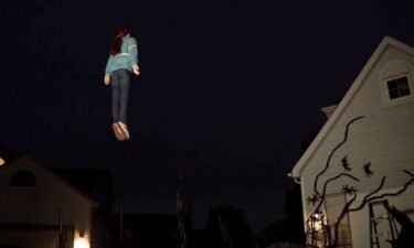 It looks like a real girl dressed as Sadie Sink's Max Mayfield character from "Stranger Things" is hovering in midair. It's not a real person - it's a mannequin - but the family behind it is keeping how it works a mystery.