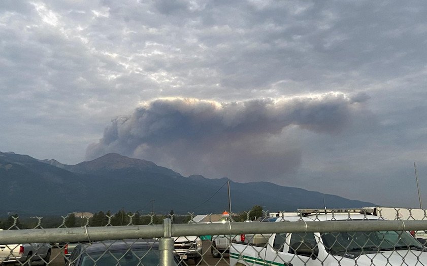 Smoke column rises from Sturgill Fire, about 15 miles southwest of Enterprise