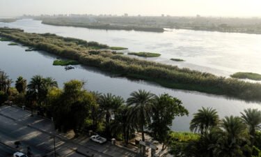 The Nile River is seen flowing through the Egyptian capital Cairo's southern suburb of Kozzika in 2019.