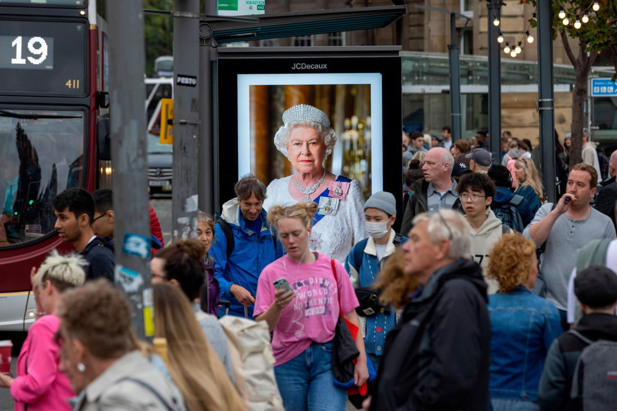 <i>Robert Perry/Getty Images</i><br/>An image of the Queen is displayed on a bus stop in Edinburgh