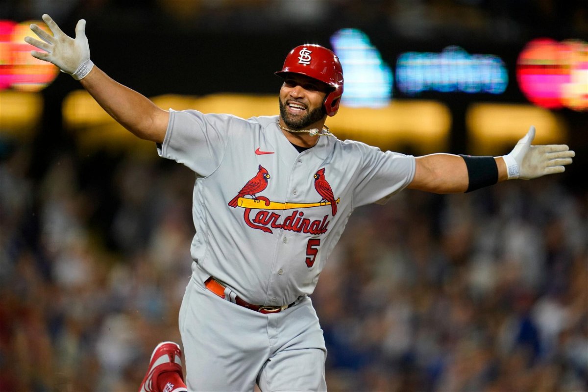 <i>Ashley Landis/AP</i><br/>St. Louis Cardinals designated hitter Albert Pujols reacts after hitting a home run during the fourth inning against the Los Angeles Dodgers in Los Angeles on Friday.