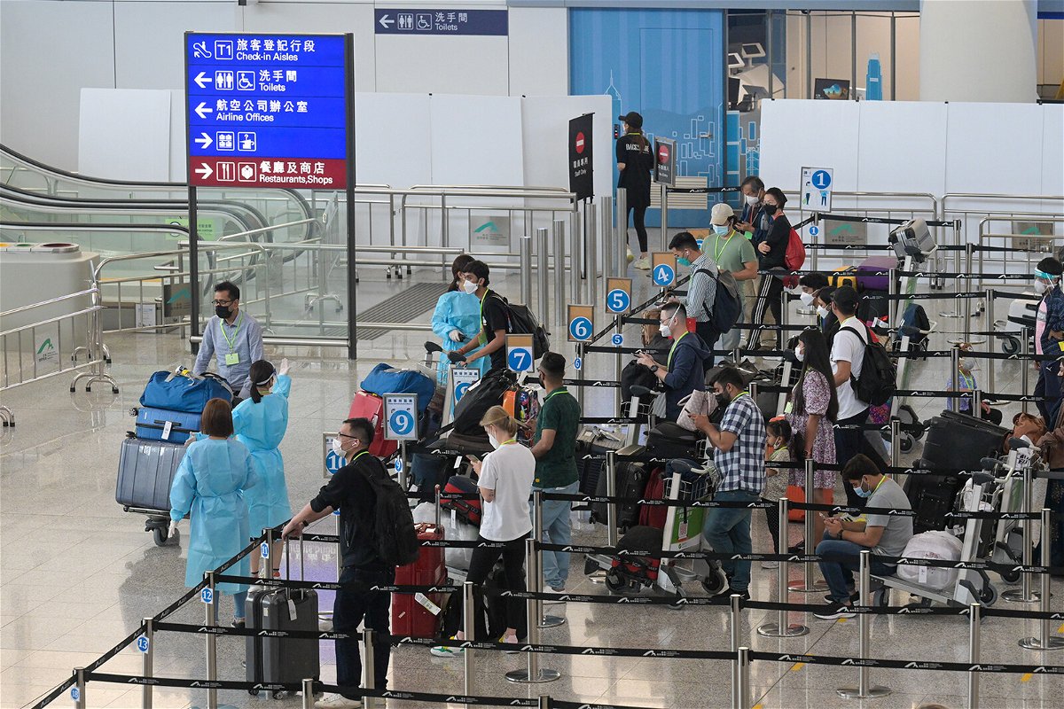 <i>Chen Yongnuo/China News Service/Getty Images</i><br/>The Hong Kong government announced the ending of formal quarantine for international travelers after more than two and a half years of stringent pandemic controls. Travelers are seen at the Hong Kong International Airport in August 2022.