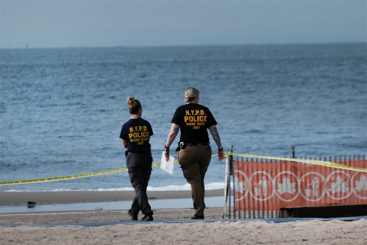 <i>Spencer Platt/Getty Images</i><br/>Police are seen here working along a stretch of beach at Coney Island