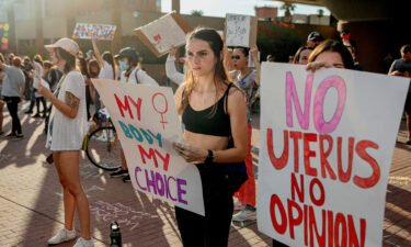 Abortion rights protesters chant during a Pro Choice rally in Tucson