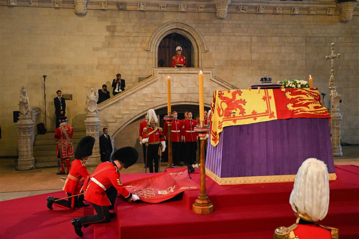 <i>POOL/AFP via Getty Images</i><br/>5 things to know for September 15 includes Queen Elizabeth II inside Westminster Hall