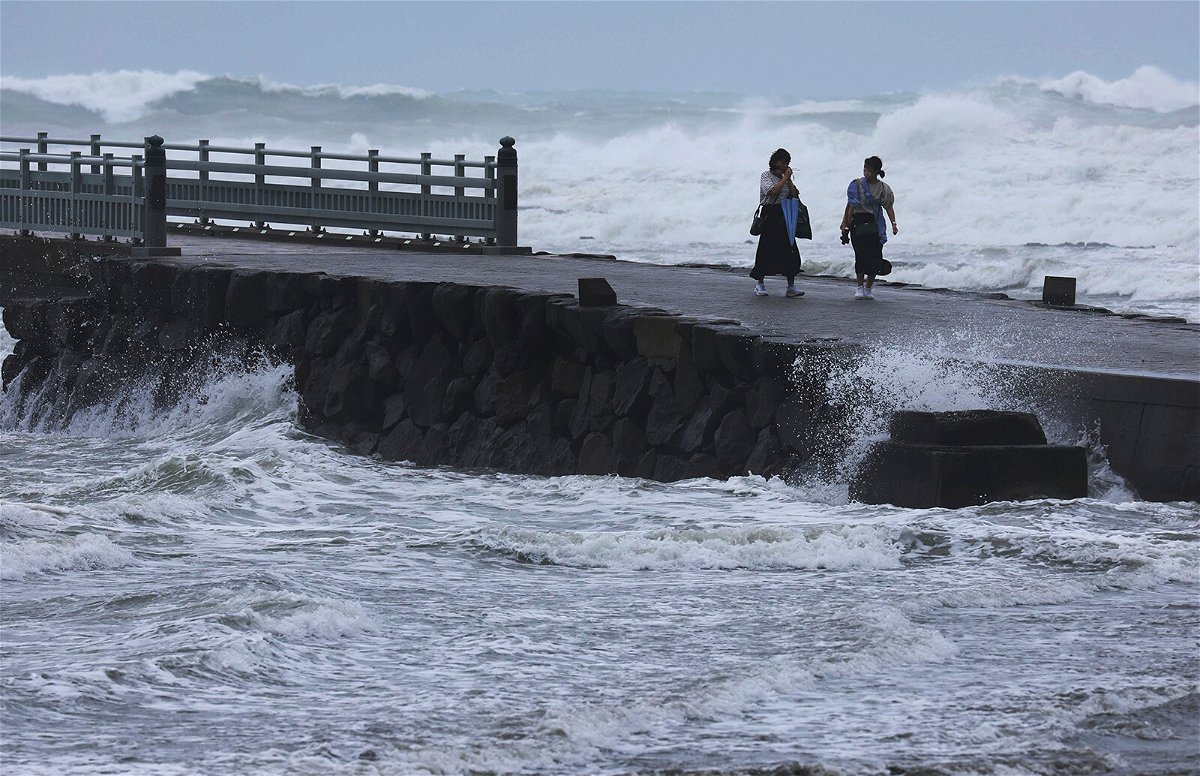 <i>Tosei Kisanuki/AP</i><br/>Waves crash on the shore in Miyazaki City