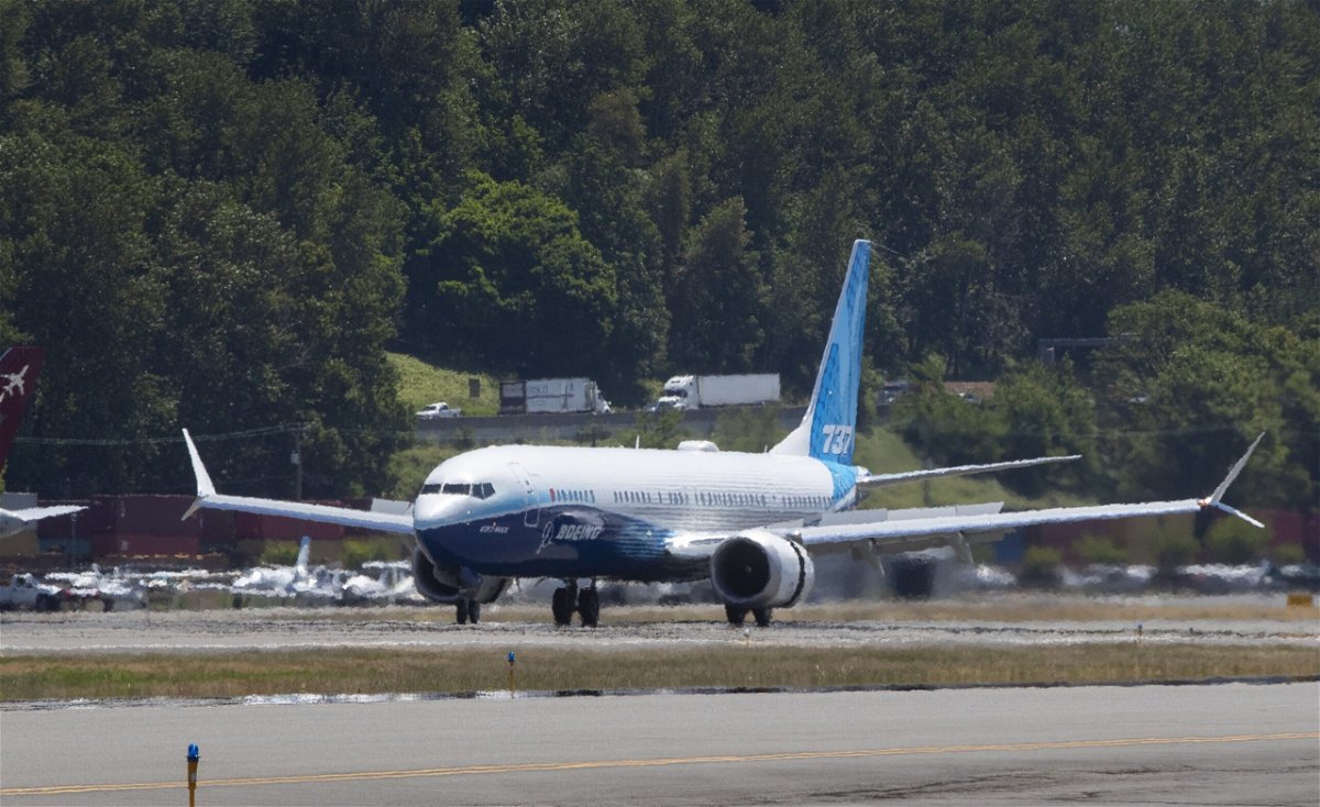 <i>Ellen Banner/Pool/Getty Images</i><br/>A Boeing 737 Max 10 airliner taxis at Boeing Field in June 2021 in Seattle