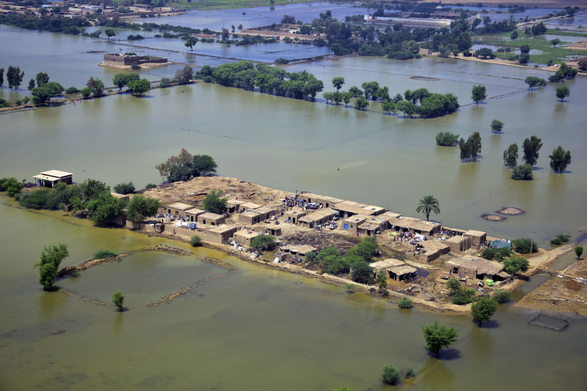 <i>Arshad Butt/AP</i><br/>Homes surrounded by floodwaters in Jaffarabad