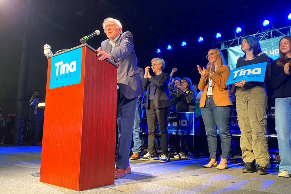  Sen. Bernie Sanders, of Vermont, speaks at an event as Oregon Democratic gubernatorial candidate Tina Kotek, back left, claps in Portland on Thursday
