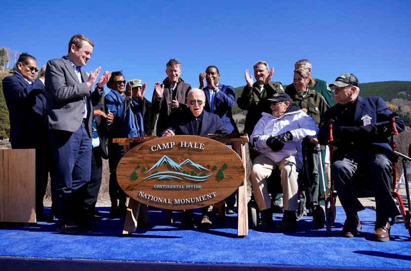 President Joe Biden reacts after signing a proclamation to designate the first national monument of his administration at Camp Hale, a World War II-era training site, near Leadville, Colo.,on Wednesday