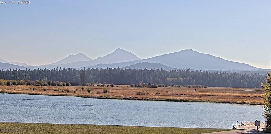 Central Oregon's air quality was improving again Tuesday but mountain views were still hazy, as in Black Butte Ranch webcam view