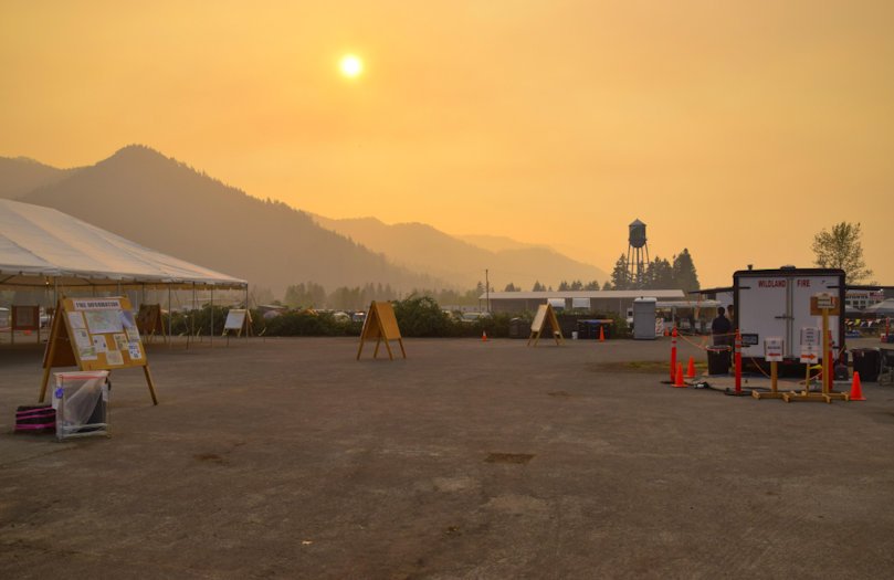 Warm, dry weather pushes Cedar Creek Fire past southern containment lines, prompting air attack