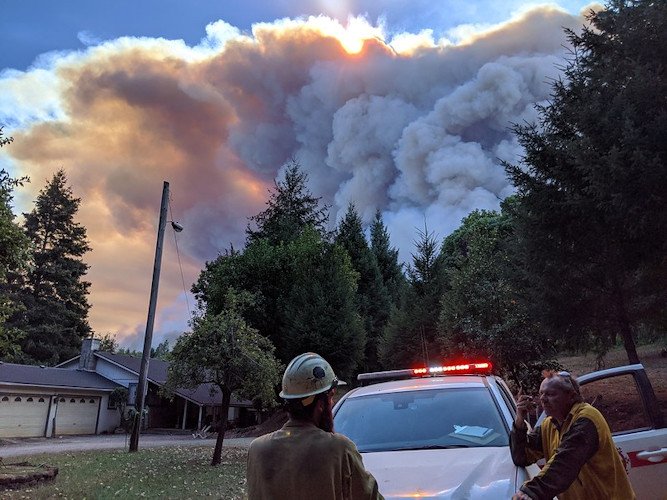 Authorities respond to the 2020 Slater fire in Happy Camp, California, during the first day of explosive fire growth after which over 90,000 acres were burned and over 200 homes were lost
