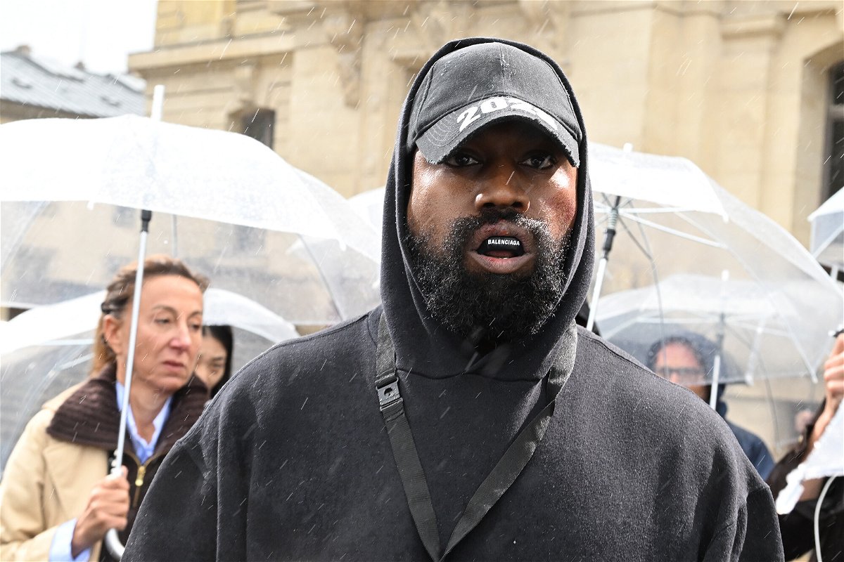 <i>Stephane Cardinale/Corbis/Getty Images</i><br/>George Floyd's family is considering legal action against Kanye West. The rapper is pictured here on October 2 in France.