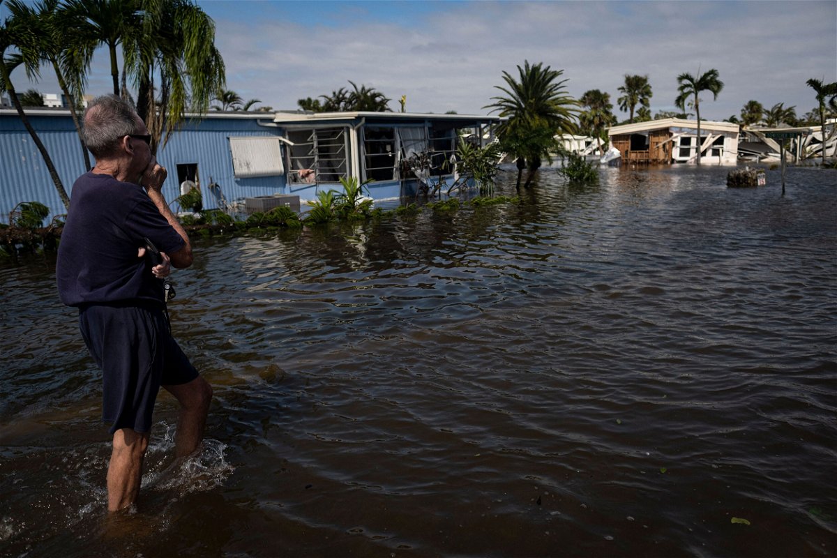 <i>Ricardo Arduengo/AFP/Getty Images</i><br/>Flooded homes in Fort Myers