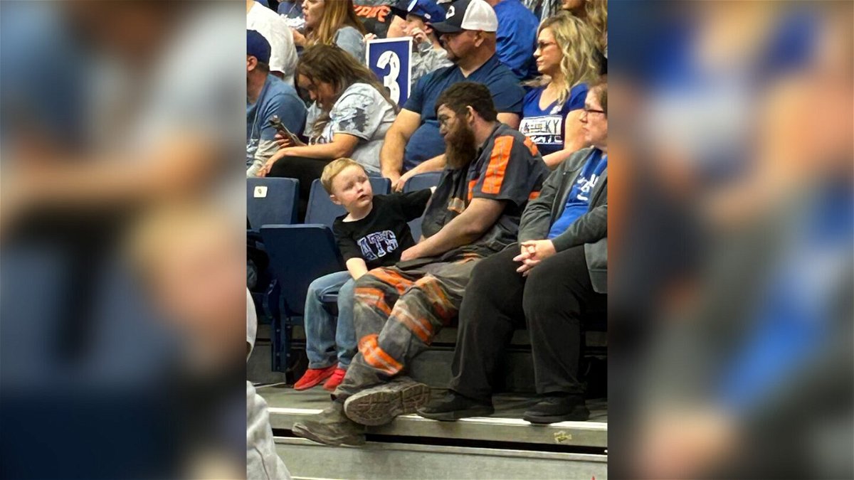 <i>Courtesy Sue Kinneer</i><br/>Michael McGuire rushed straight from work to take his family to a Wildcats practice game because he didn't want to miss his son's first basketball experience.
