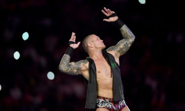 World Heavyweight Champion Randy Orton poses for photographers during the World Wrestling Entertainment Super Showdown event in the Saudi Red Sea port city of Jeddah late on January 7